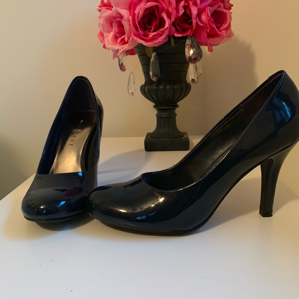 Metaphor dark navy blue shoes.